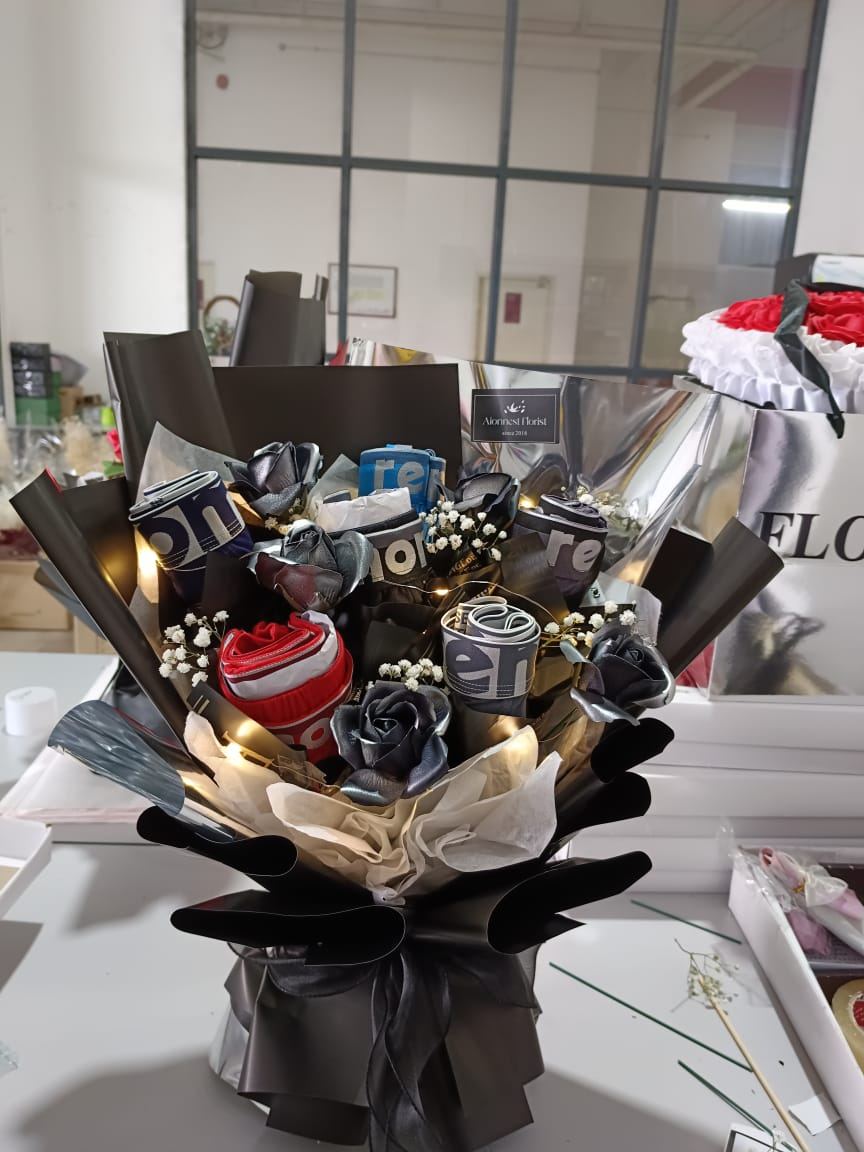 Black snack bouquet with fairy lights